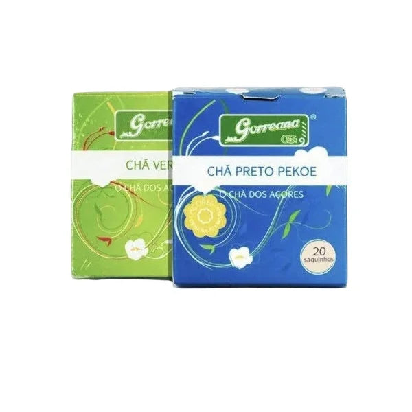 Gift Box - 6 Pack Organic Premium Tea Gorreana Azores (4x100g Loose Leaf + 2x10 Tea Bags) Two boxes of Gorreana tea, one green tea and one black pekoe, each with floral designs and 20 tea bags