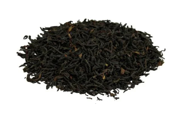 Gorreana tea and Porto Formoso tea green and black tea leafs close up Atlantic Ocean São Miguel Azores Loose dried black tea leaves piled on white background, high quality Cha Preto Gorreana